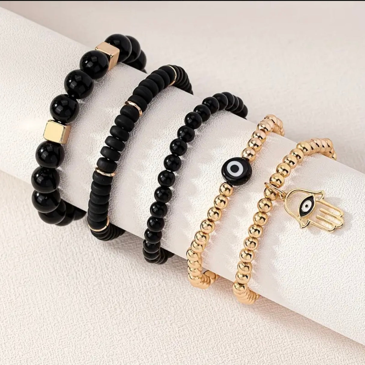 Beautiful Set Of 5 bracelets with Evil Eye and hamsa on black polymer clay for Protection and luck