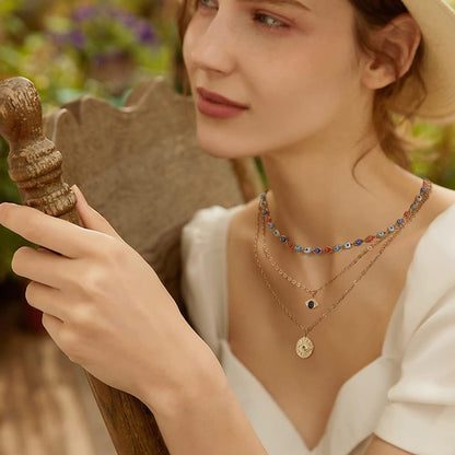 Dainty Layered Evil Eye Necklace Gold Plated stainless Steele with a Blue Eye Pendant and Multilayered and Adjustable Layering Choker Necklaces.