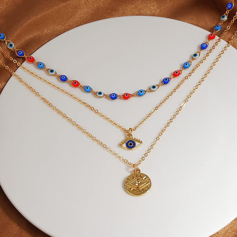 Dainty Layered Evil Eye Necklace Gold Plated stainless Steele with a Blue Eye Pendant and Multilayered and Adjustable Layering Choker Necklaces.